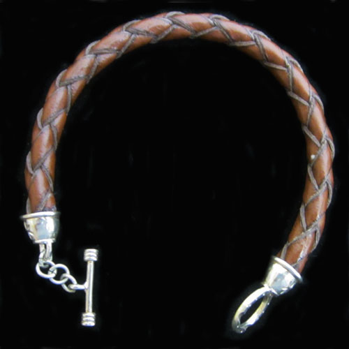  Imagen pulseras plata y cuero 
